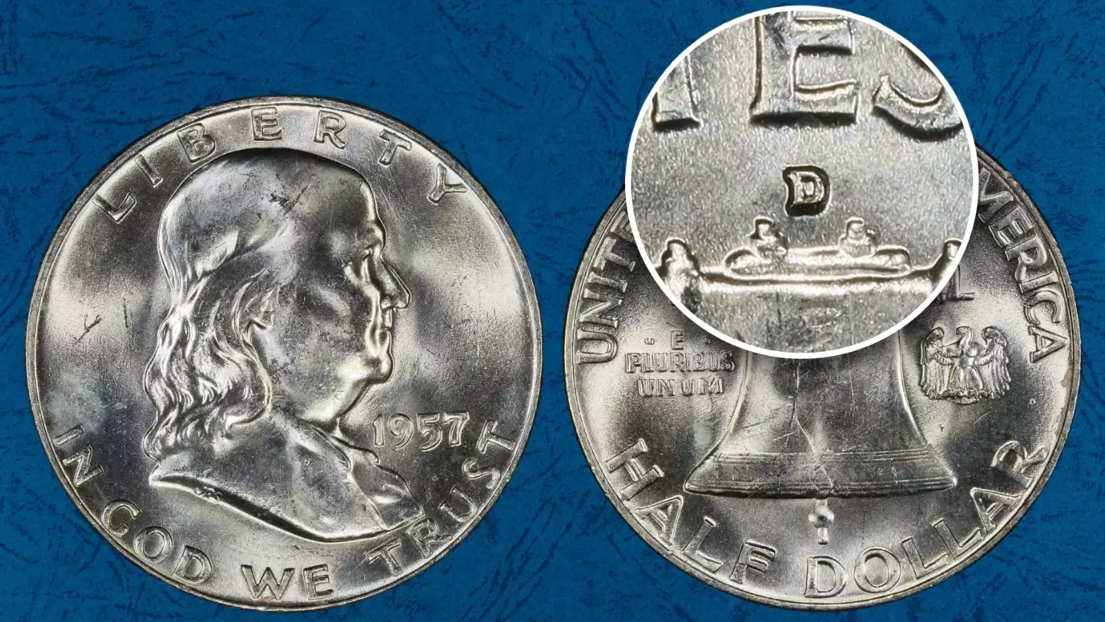 1957-D Franklin half dollar RPM FS-501 close-up showing repunched D mint mark with secondary counter-clockwise impression above Liberty Bell